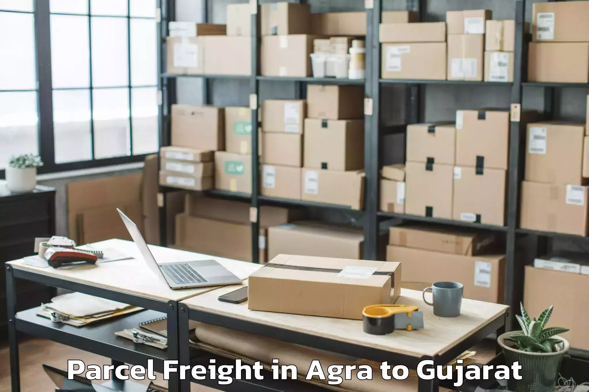 Efficient Agra to Jhulasan Parcel Freight